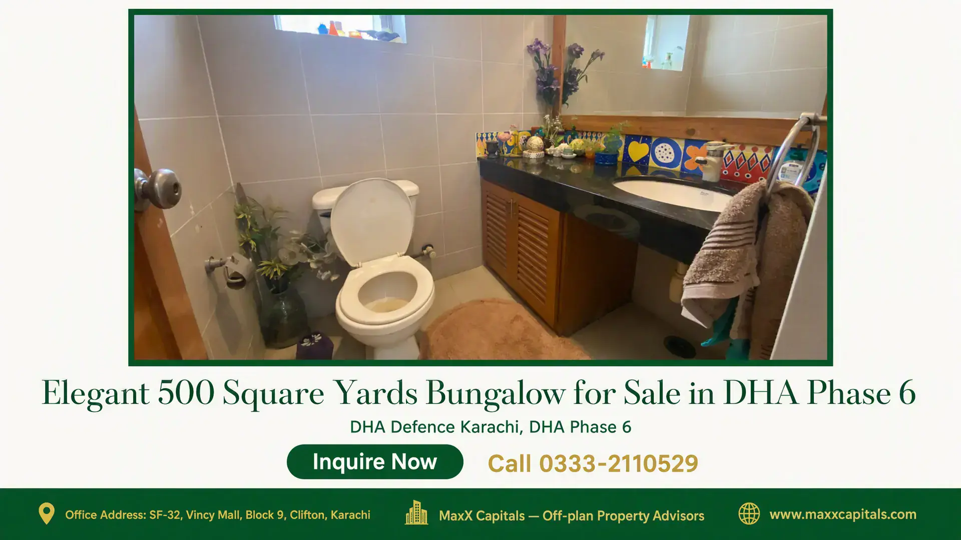Elegant 500 Square Yards Bungalow for Sale in DHA Phase 6 Modern bathroom in a 500 square yards bungalow for sale in DHA featuring tiled walls, a sleek countertop, and accent decor.