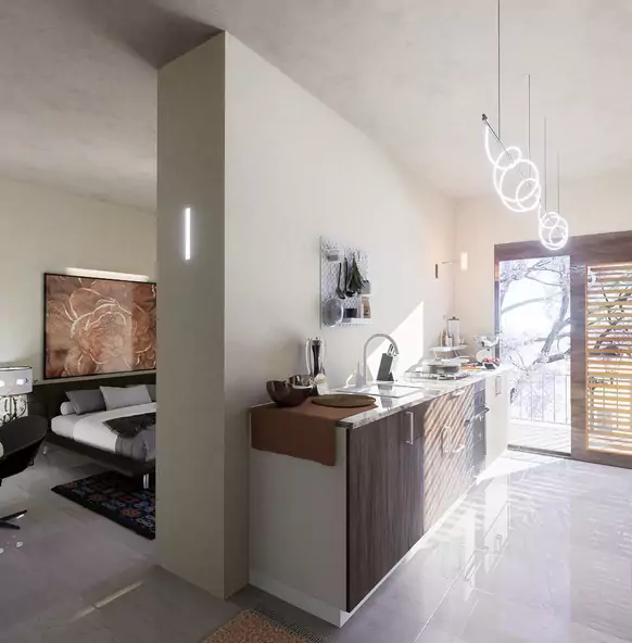 The Nishat Residency Dha Phase 6 Defence Karachi (9) Modern open-plan kitchen with wood cabinets, sink, pendant lights, adjacent bedroom with bed and large window in Nishat Resid