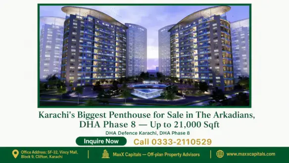 Night view of The Arkadians in DHA Phase 8, Karachi, showcasing twin luxury towers and a central illuminated fountain.