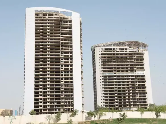 Two Tall Curved High-Rise Towers Under Construction In Dha Karachi, Site Of Biggest Penthouse For Sale