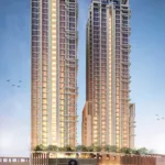 Falaknaz Tiara Twin High-Rise Towers In Karachi With Modern Glass Facades, Illuminated Windows, Landscaped Base And Evening S