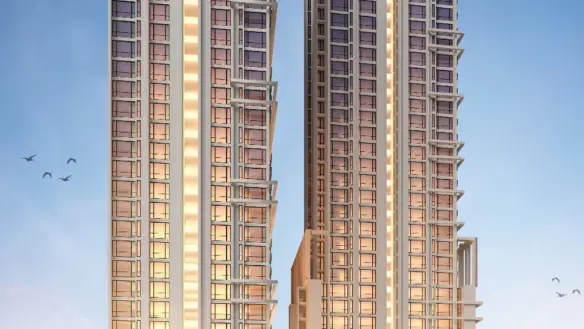 Falaknaz Tiara Twin High-Rise Towers In Karachi With Modern Glass Facades, Illuminated Windows, Landscaped Base And Evening S