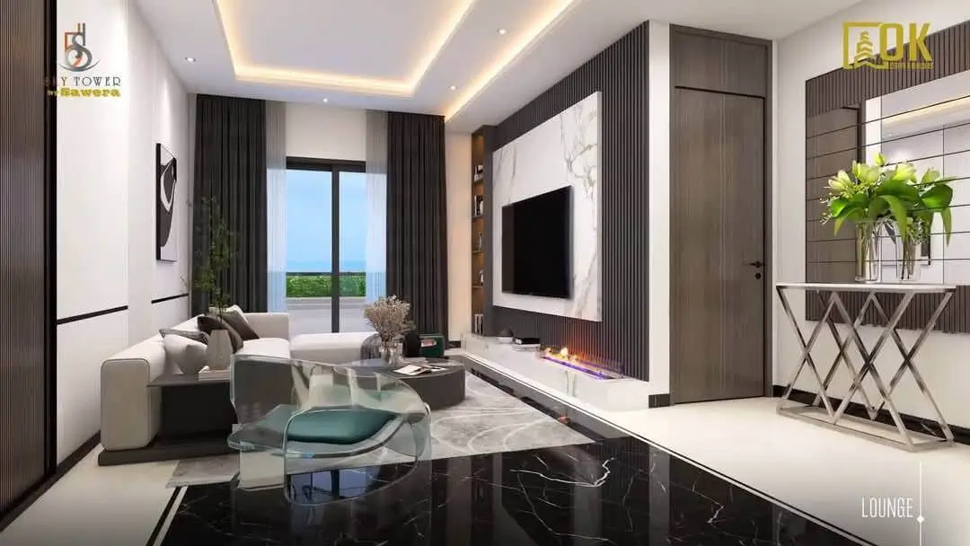 Sawera 5 Sky Tower Clifton Karachi Luxury 3 & 4-Bed Apartments with Pool & 4-Year Installment Plan (4) MaxX Capitals luxury Clifton apartment lounge in Sawera 5 Sky Tower with modern TV wall and balcony view