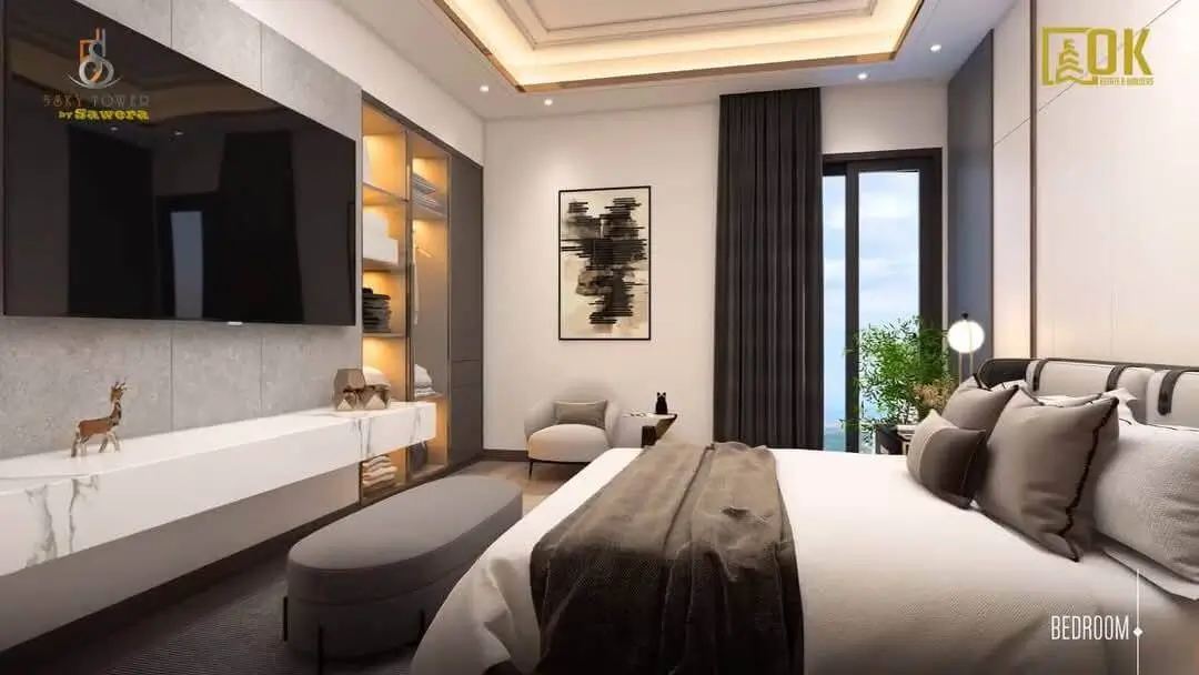 Sawera 5 Sky Tower Clifton Karachi Luxury 3 & 4-Bed Apartments with Pool & 4-Year Installment Plan (9) Sawera 5 Sky Tower Clifton bedroom interior by MaxX Capitals with bed, TV wall, and window view