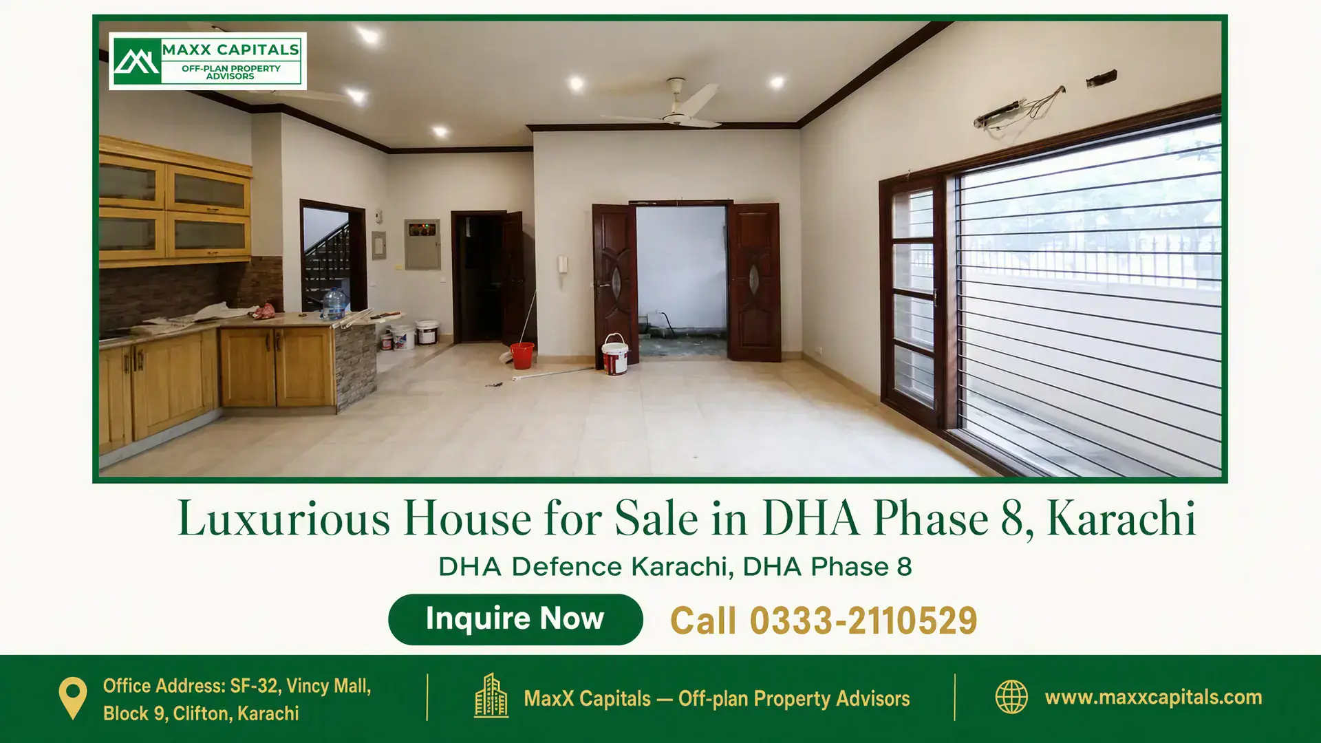Luxurious House for Sale in DHA Phase 8, Karachi Spacious modern interior with wooden cabinets, tiled flooring, large windows, and double wooden doors in a house for sale in
