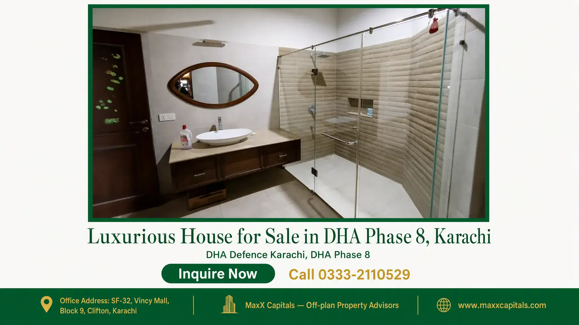 Luxurious House for Sale in DHA Phase 8, Karachi Modern bathroom in a house for sale in DHA Phase 8 with a large glass shower area, wooden vanity, and oval mirror.