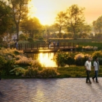 Lagoon Views Tower 1 High-Rise Buildings With Lagoon, Landscaped Gardens, Pathways, Trees, And Sunset Sky
