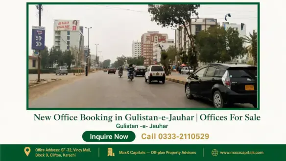 Wide urban street in Gulistan-e-Jauhar lined by commercial buildings, trees, and vehicles.