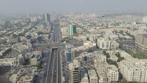 Aerial View Of Clifton Block 7 Urban Skyline With High-Rises, Residential Buildings, Highways, Overpasses And Traffic In Rent