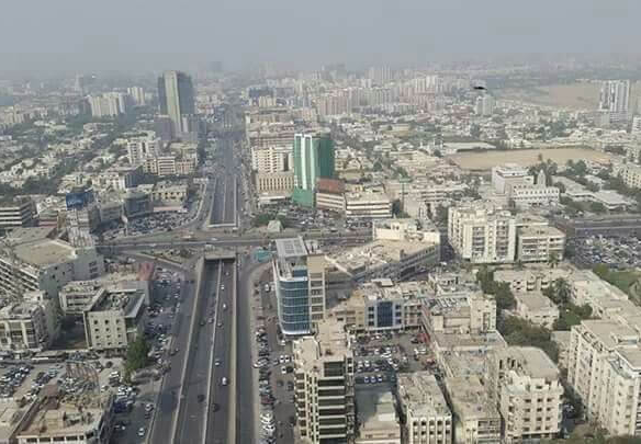 Aerial View Of Clifton Block 7 Urban Skyline With High-Rises, Residential Buildings, Highways, Overpasses And Traffic In Rent