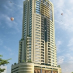 Maxx Capitals: Grand Monarch Seaside Apartment Tower Exterior With Landscaped Podium And Sky View