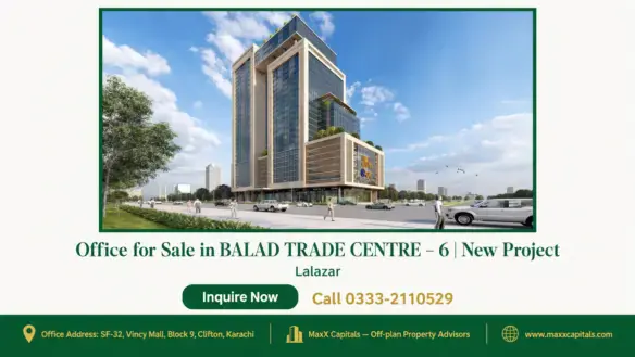 Modern high-rise building with glass facade and green landscaping at Balad Trade Centre under a clear blue sky.