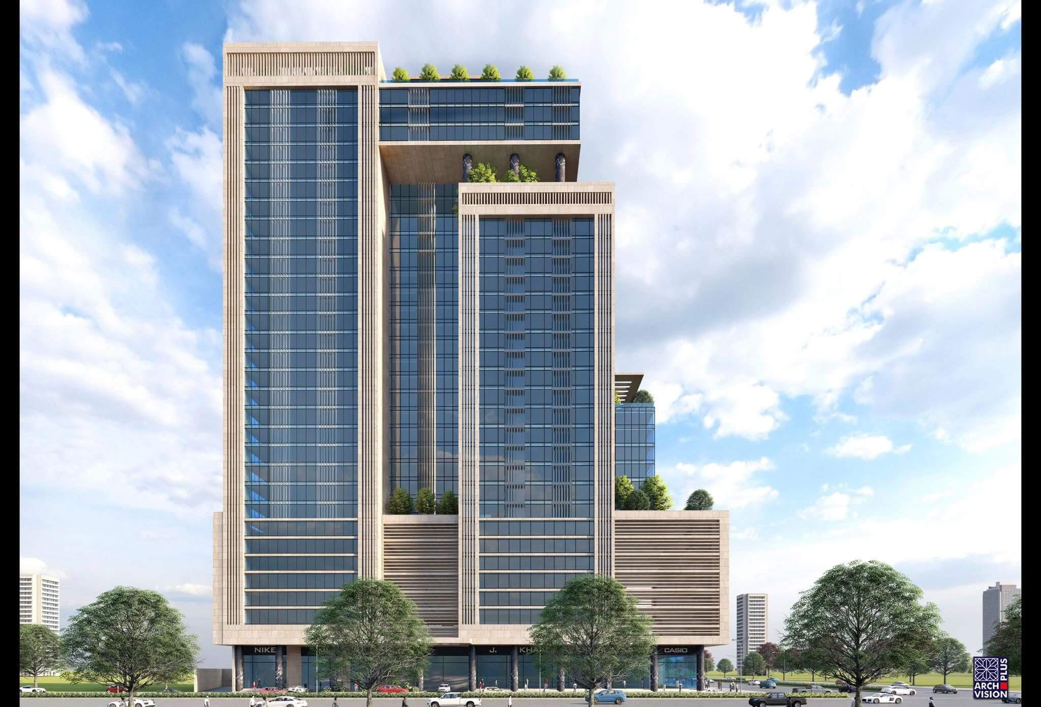 Office for Sale in BALAD TRADE CENTRE – VI A New Chapter in Commercial Excellence (2) Modern high-rise office building in Balad Trade Centre with blue glass facades, beige accents, rooftop greenery and surroundi