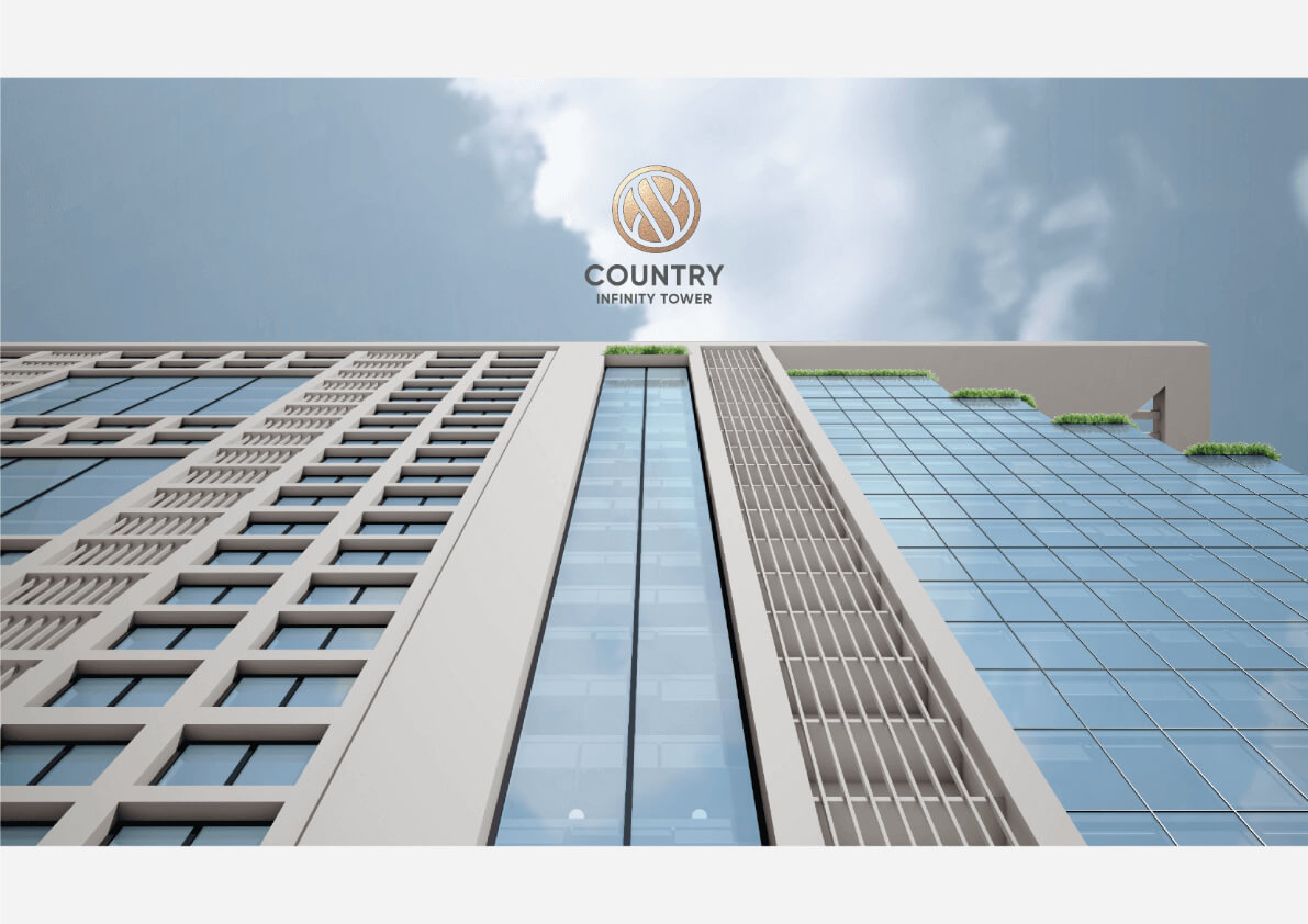 Country Infinity Tower Premium Office Spaces in Clifton, Karachi (2) Angled view of Country Infinity Tower in Clifton with blue-tinted glass facade, vertical grilles, and rooftop greenery