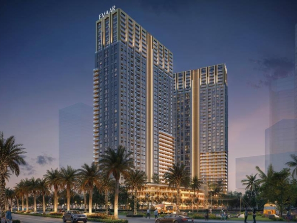Park Edge By Emaar Oceanfront High-Rise Towers At Twilight In Karachi, With Palm Trees And Waterfront Boulevard