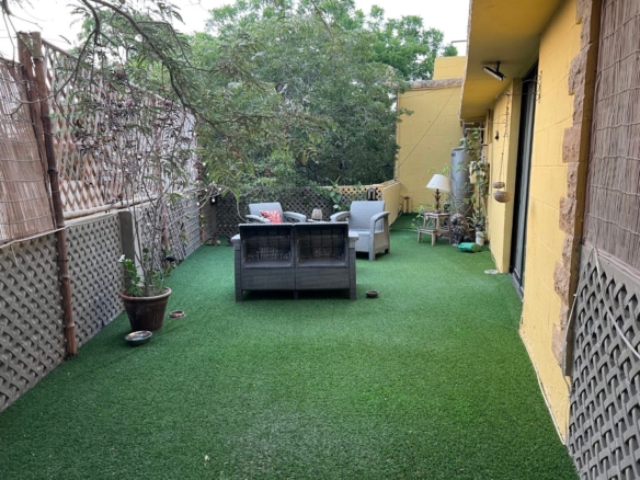 Fully Furnished Outdoor Terrace With Artificial Grass Lawn, Grey Sofa Set, Potted Plants, Bamboo Fencing In Portion For Rent 