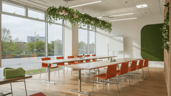Modern Conference Room At Country Business Avenue, Block 8, Clifton, Karachi With Large Windows, Wooden Table, Orange Chairs,