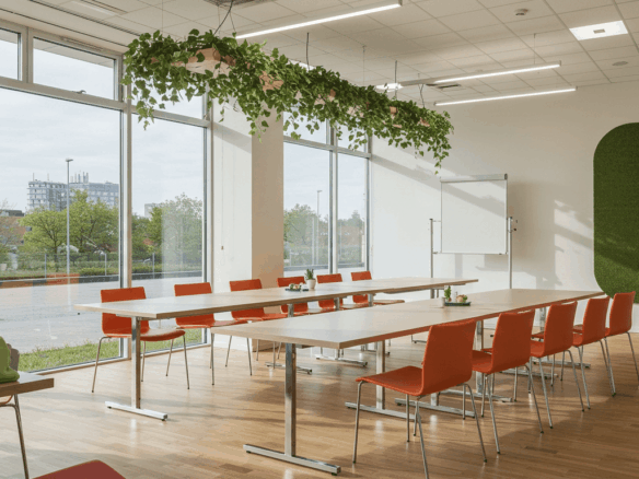 Modern Conference Room At Country Business Avenue, Block 8, Clifton, Karachi With Large Windows, Wooden Table, Orange Chairs,