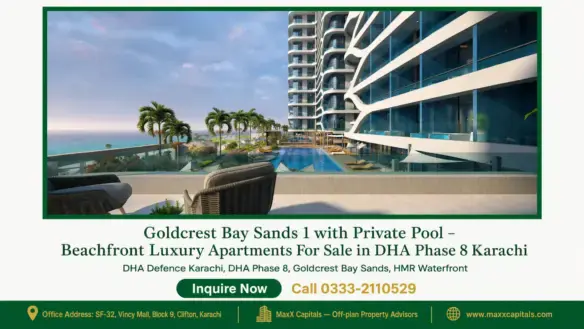 Beachfront luxury apartment in Goldcrest Bay Sands 1, featuring modern architecture, a private pool, and lush landscaping in