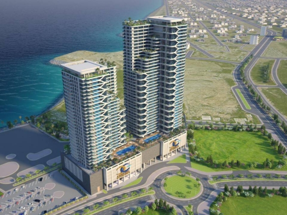 Aerial View Of Goldcrest Bay Sands 1 Beachfront Towers In Dha Phase 8 Karachi With Private Pools, Modern Architecture, And Se