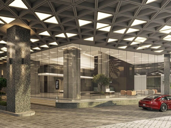 Grand glass entrance lobby of Faisal One Metropole corporate offices on Shahra-e-Faisal with geometric ceiling, pillars, and 