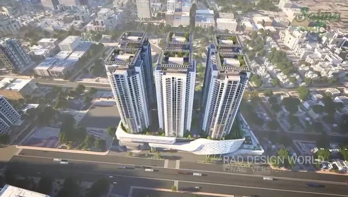 Saima Center Point Luxury Living in Karachi MaxX Capitals (2) Aerial view of three modern high-rise towers at Saima Center Point in Karachi, with white facades, green rooftops, and urban