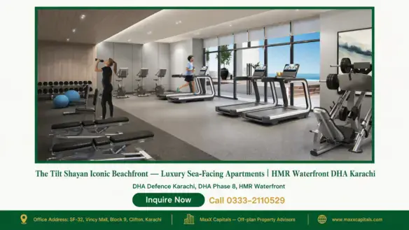 Modern beachfront gym with premium fitness equipment at The Tilt Shayan Iconic Beachfront, overlooking the sea.