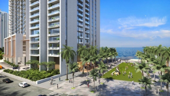 MaxX Capitals The Views Emaar Karachi seafront high-rise with palm-lined promenade and landscaped lawn