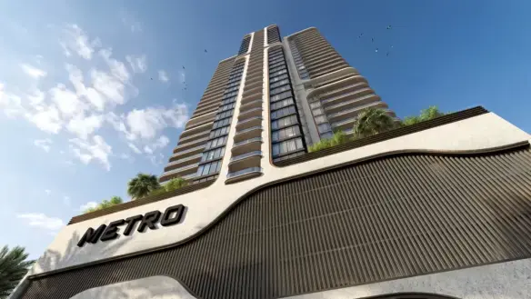 MaxX Capitals Metro Livings Clifton high-rise apartment tower with curved balconies in Karachi