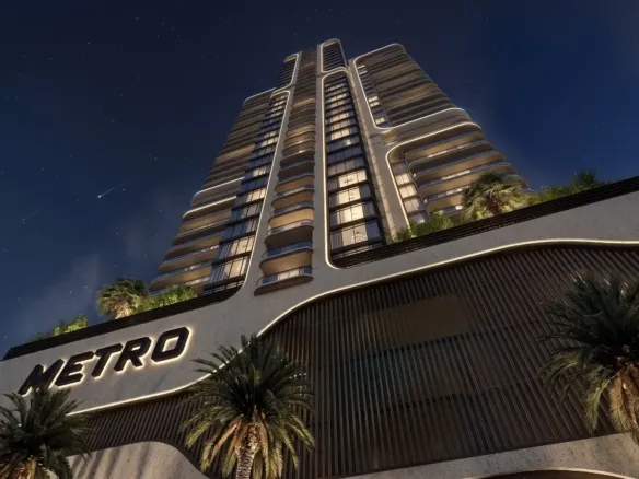 MaxX Capitals renders Metro Livings Clifton tower with illuminated facade and palm-lined podium in Karachi