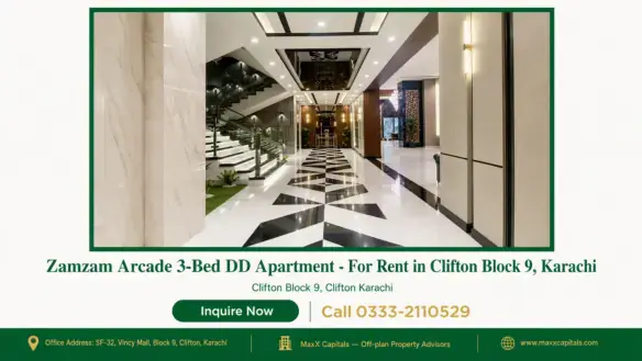 Grand entrance lobby of a luxury apartment for rent in Clifton Block 9 featuring geometric marble floors and lit stairs.