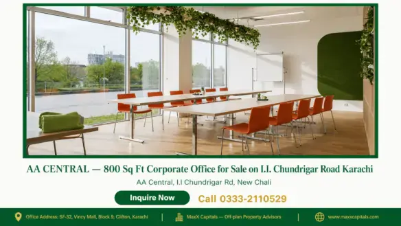 Modern office space with large windows and orange chairs, 800 sq ft office for sale in Karachi.