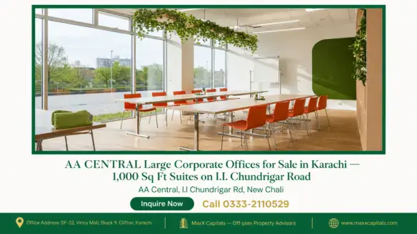 Modern office interior with large windows, natural light, and stylish furniture setup.
